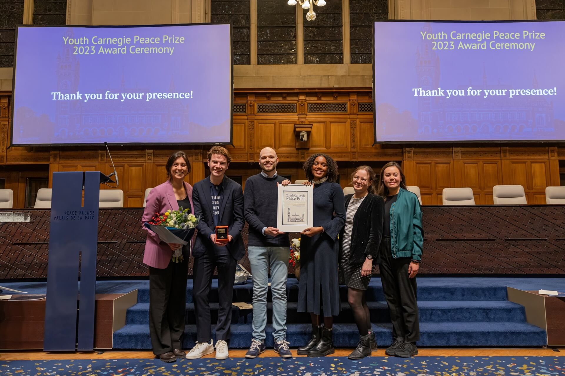 Members-of-Worlds-Youth-for-Climate-Justice-in-the-Great-Hall-of-Justice-at-the-Peace-Palace