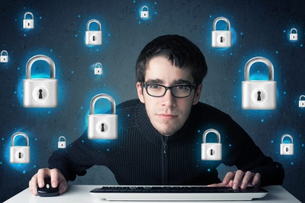 Young hacker with virtual lock symbols and icons